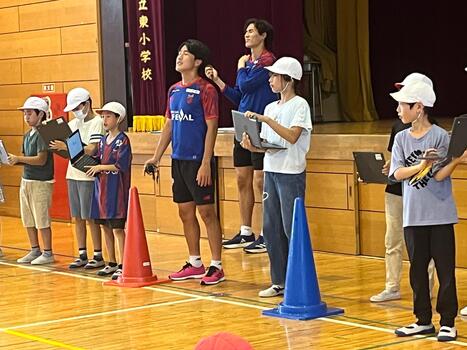 ストップウォッチ10秒止め対決の様子